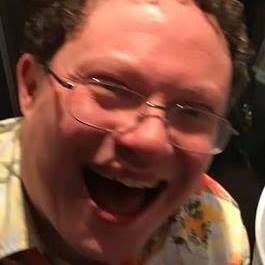This is David Edkins.  He is at a party.  He is enjoying it immensely.