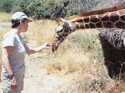 Nikki Harmon and Sara the giraffe